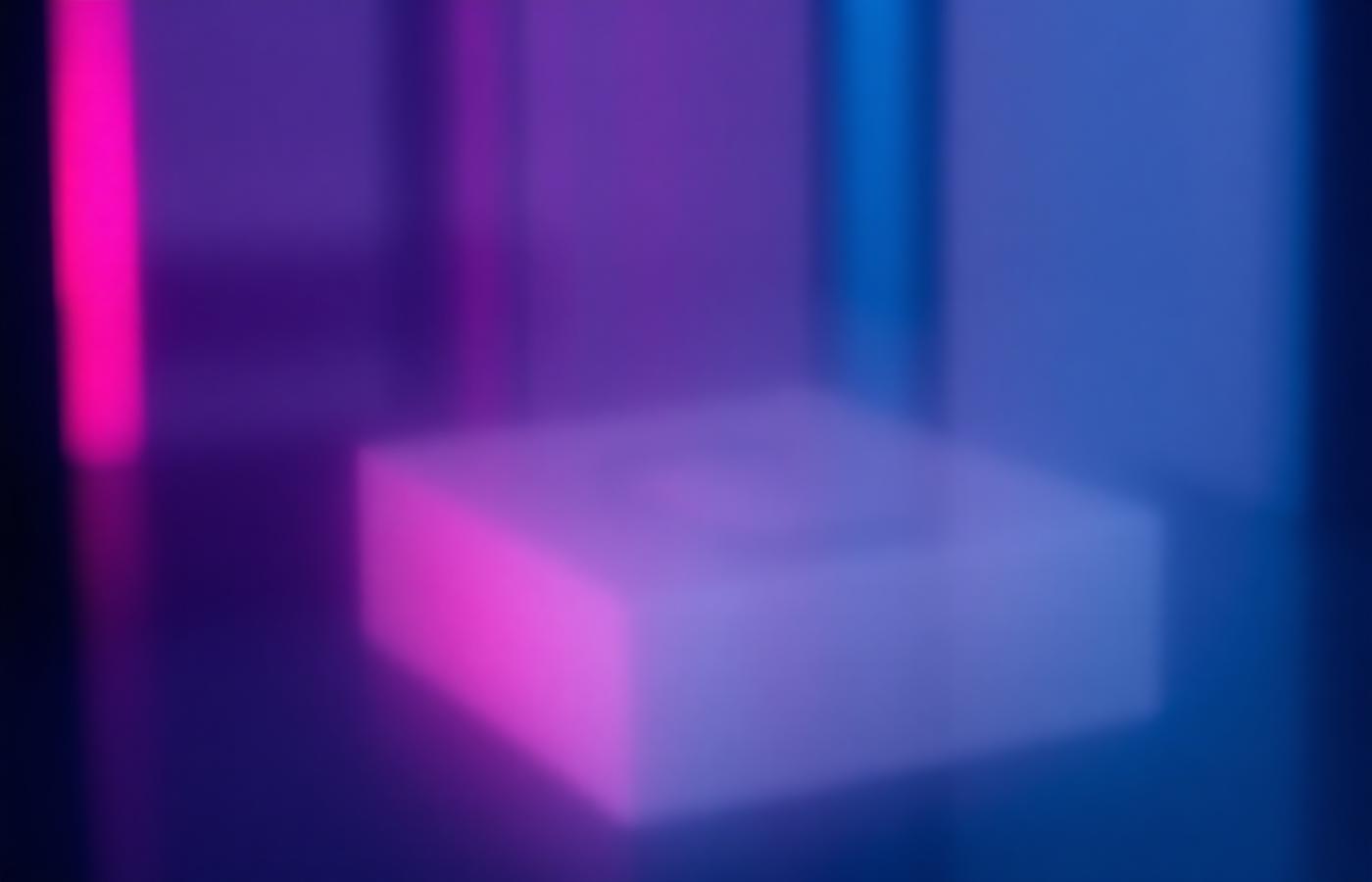 Abstract blurred light behind frosted glass representing private photographs